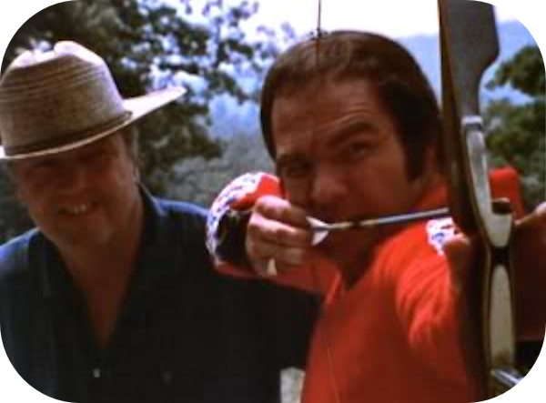 Burt Reynolds shooting a Bear Grizzly Recurve Bow